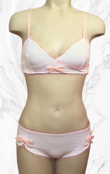 White cotton wrap style bralette with matching hipster panties with pale peach ruffle elastic and velvet bows