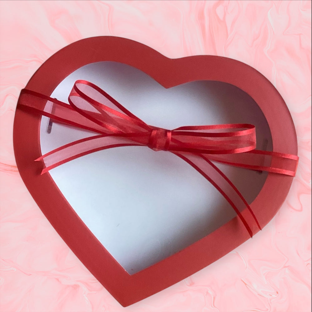 Red heart shaped gift box