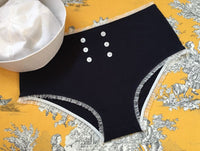 
              Greta in navy
            