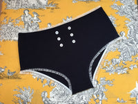 
              Greta in navy
            